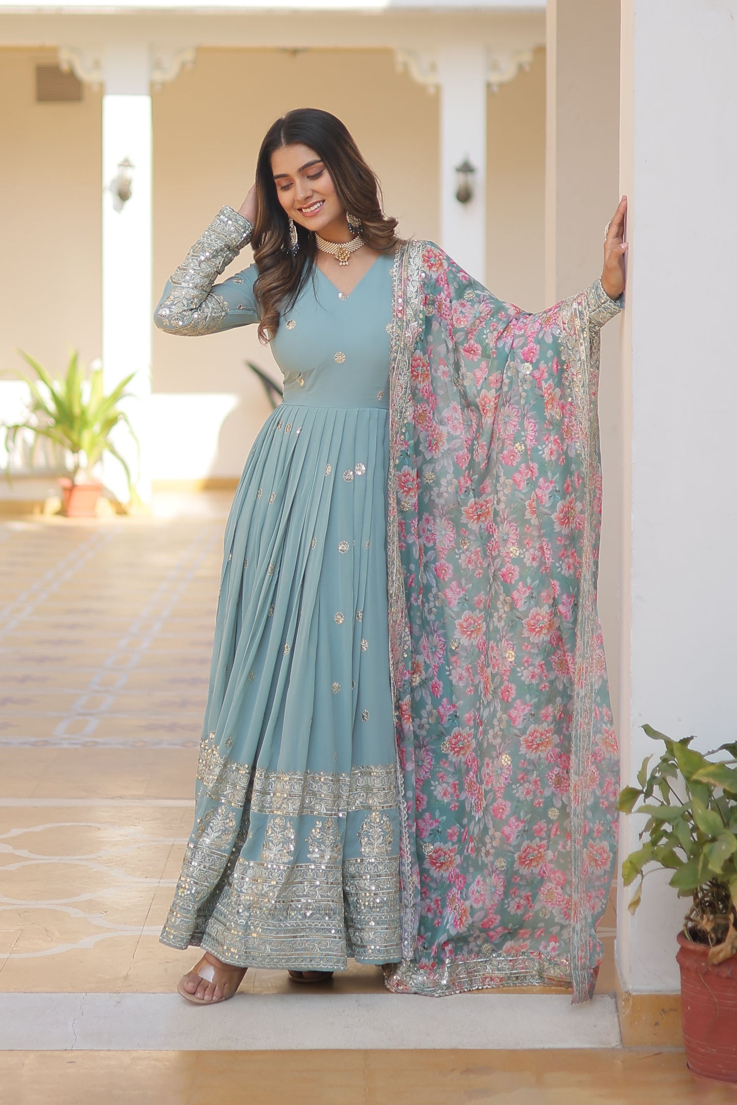 SKY FAUX GEORGETTE WITH EMBROIDERY ZARI SEQUINS-WORK GOWN