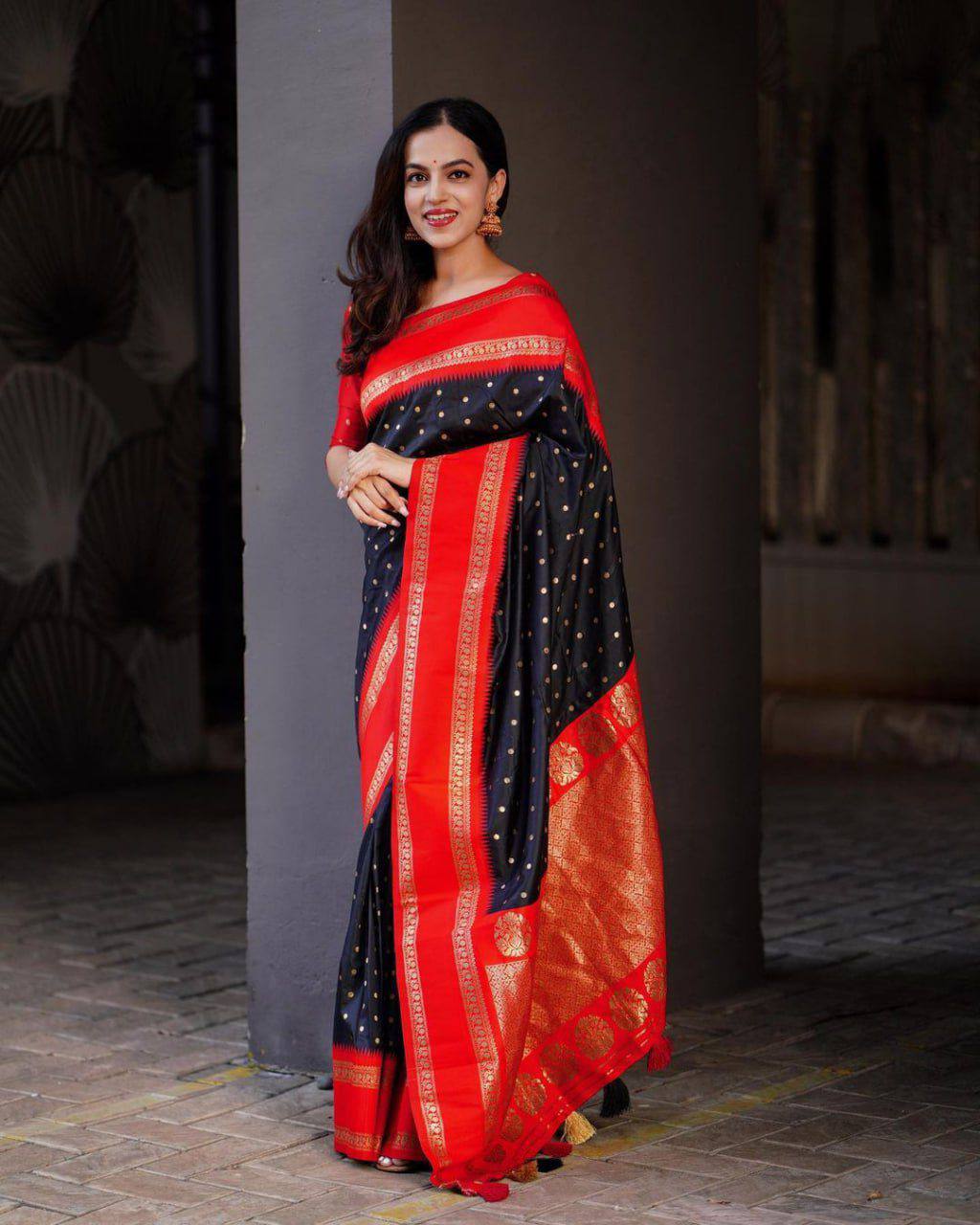 Beautiful black with golden polka motifs and a rich red border with golden zari work Saree with All-Over Jacquard Work