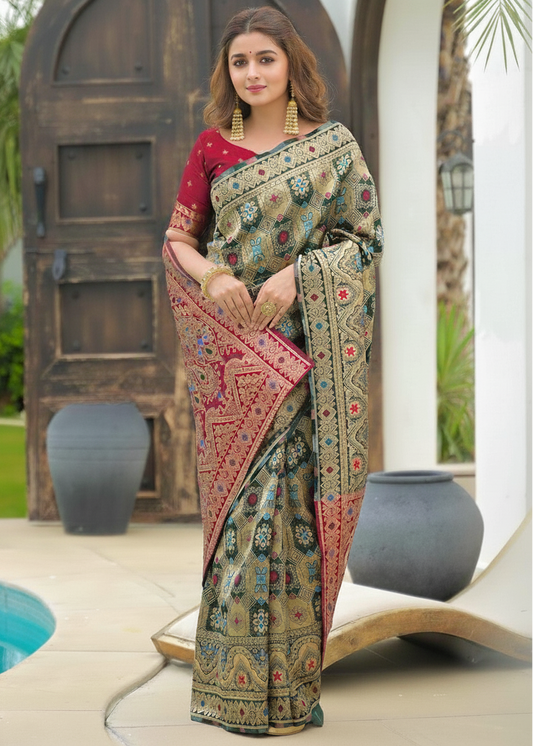 Sage Green Patola Motifs Banarasi Silk Saree with pink pallu