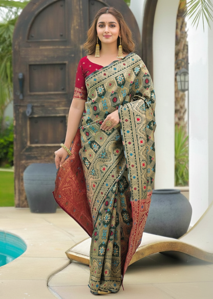 Sage Green Patola Motifs Banarasi Silk Saree with pink pallu