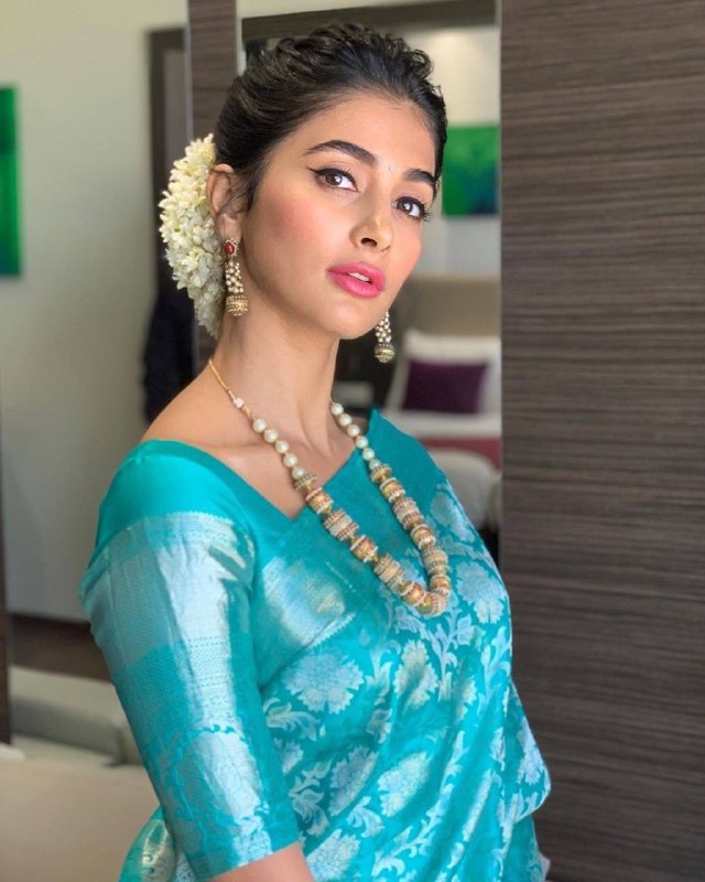 Graceful Turquoise Rich Pallu Saree with Exclusive Jacquard Work