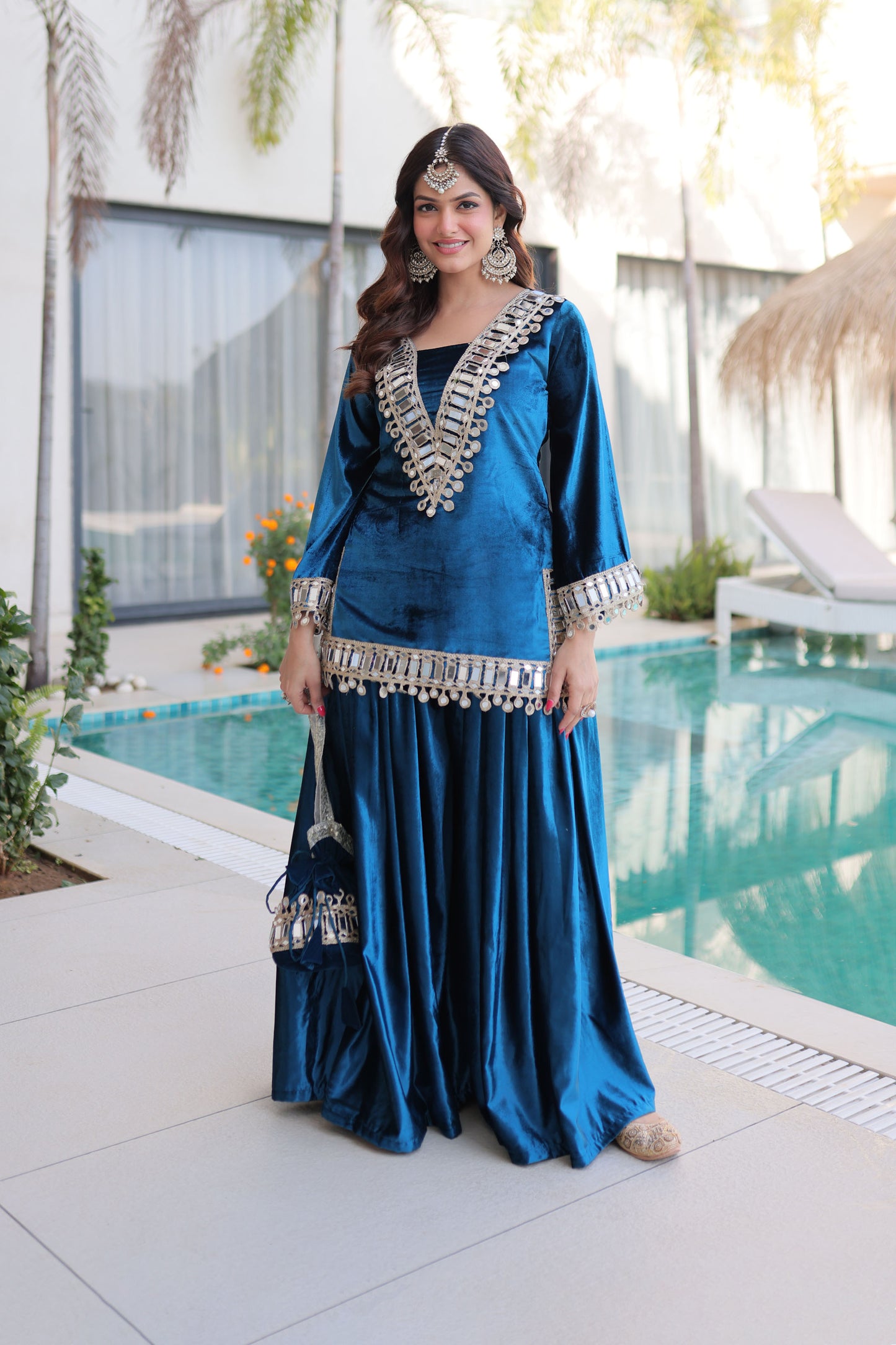 Rama Blue Mirror Work Velvet Sharara Set with Potli Bag