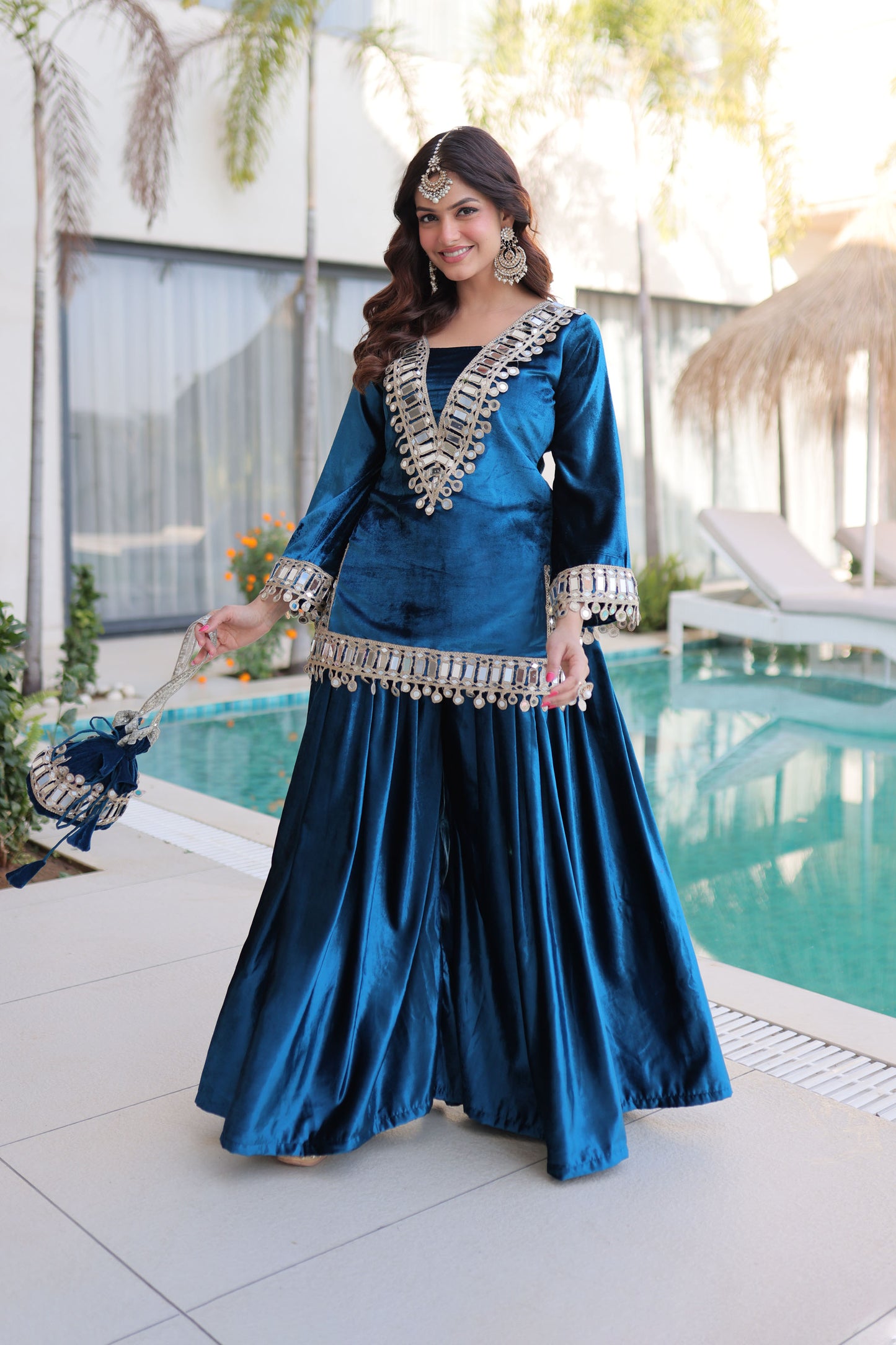 Rama Blue Mirror Work Velvet Sharara Set with Potli Bag