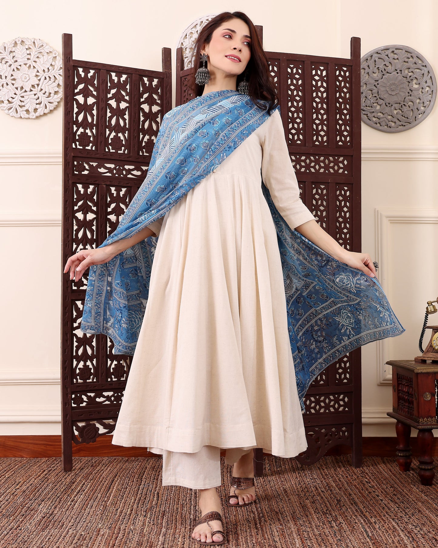 Saadhvi Ivory Plain Flared Suit Set