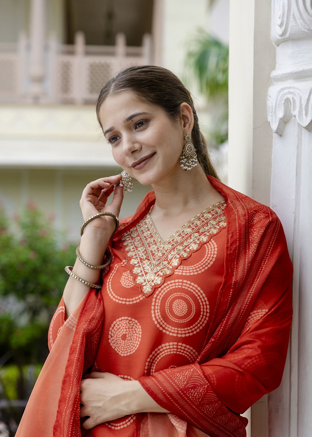 Bright Orange Printed and Embroidered Kurta Set