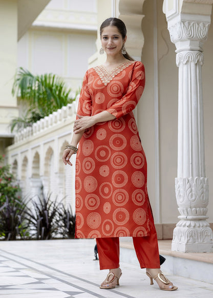 Bright Orange Printed and Embroidered Kurta Set