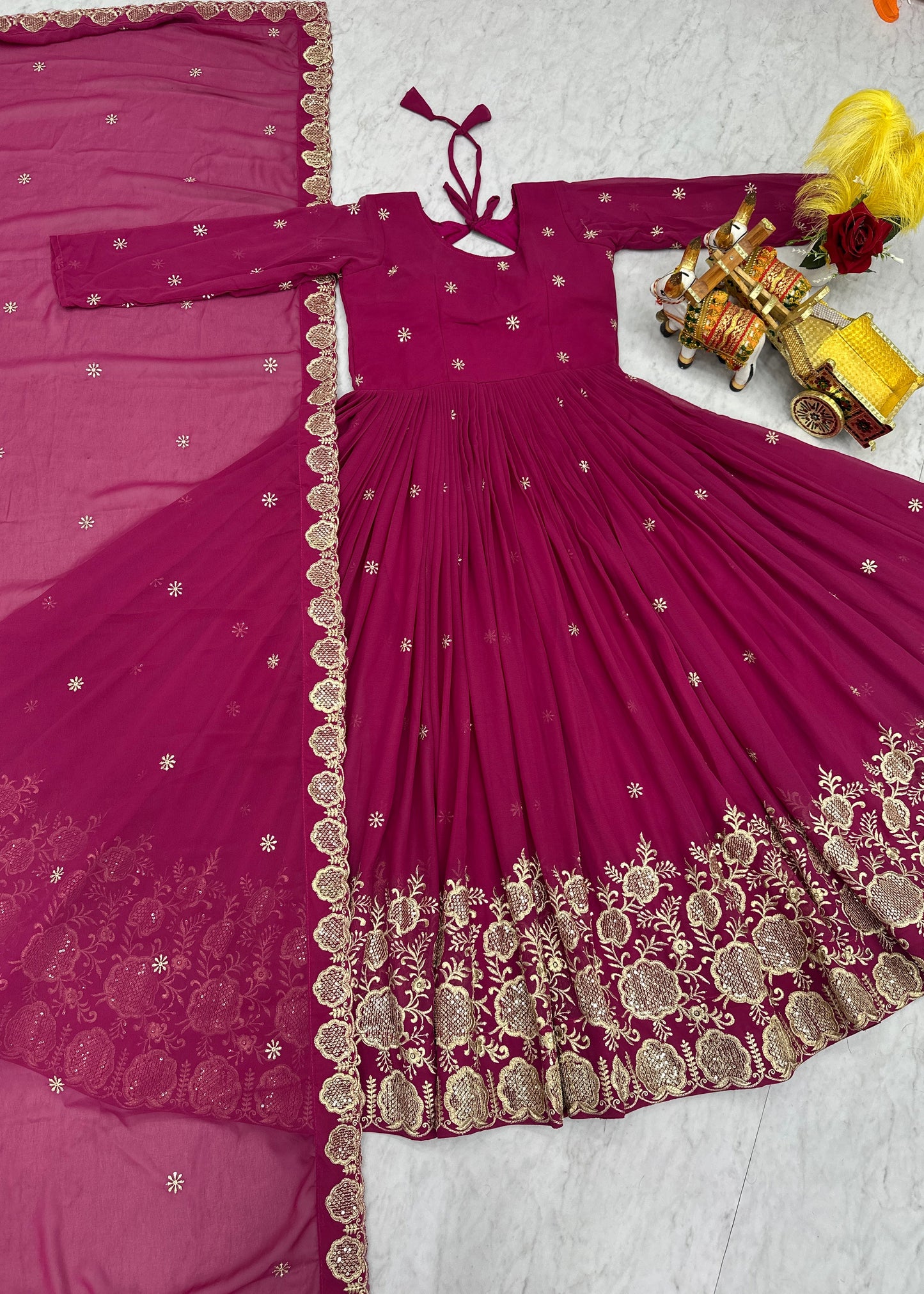 Elegant Magenta Fox Georgette Embroidered Gown